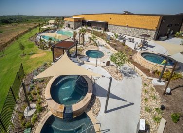 Pools and awnings at WorldSprings in The Colony